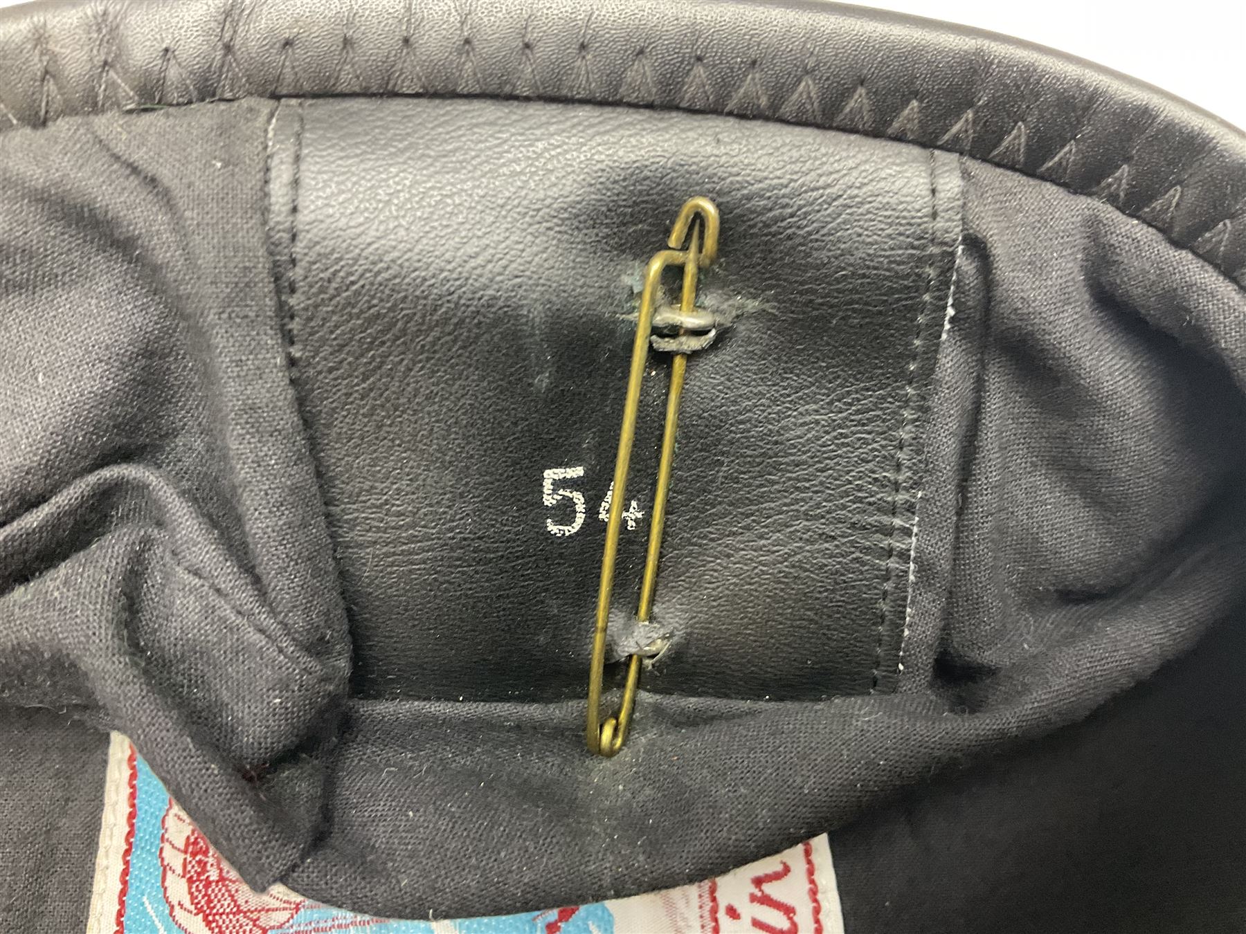 Four paratrooper berets - Russian, Italian, British and Foreign Legion; all with badges (4)