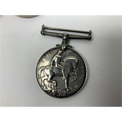 WWII group of five medals comprising 1939-45 War Medal, Defence Medal, 1939-45 Star, Africa Star and France and Germany Star on wearing bar; WWI British War Medal awarded to 142019 Pte. A. Thompson A.S.C.; and boxed King's Badge 'For Loyal Service'