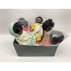 Quantity of vintage and later dolls to include unusual three faced example and further dolls marked C.J, Gloobee, Rosebud etc in three boxes