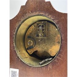 Edwardian inlaid mahogany mantel clock, stepped cavetto and arched top pediment, circular white enamel Roman dial signed 'A & J. Thompson, Scarborough', the front inlaid with fan motif, raised on globular brass feet, single train driven movement by 'R & Co. Paris'