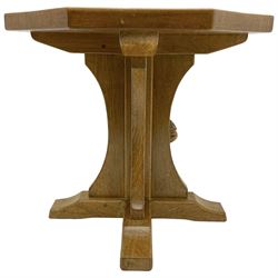 Mouseman - oak coffee table, octagonal adzed top on cruciform base, sledge feet, by the workshop of Robert Thompson, Kilburn