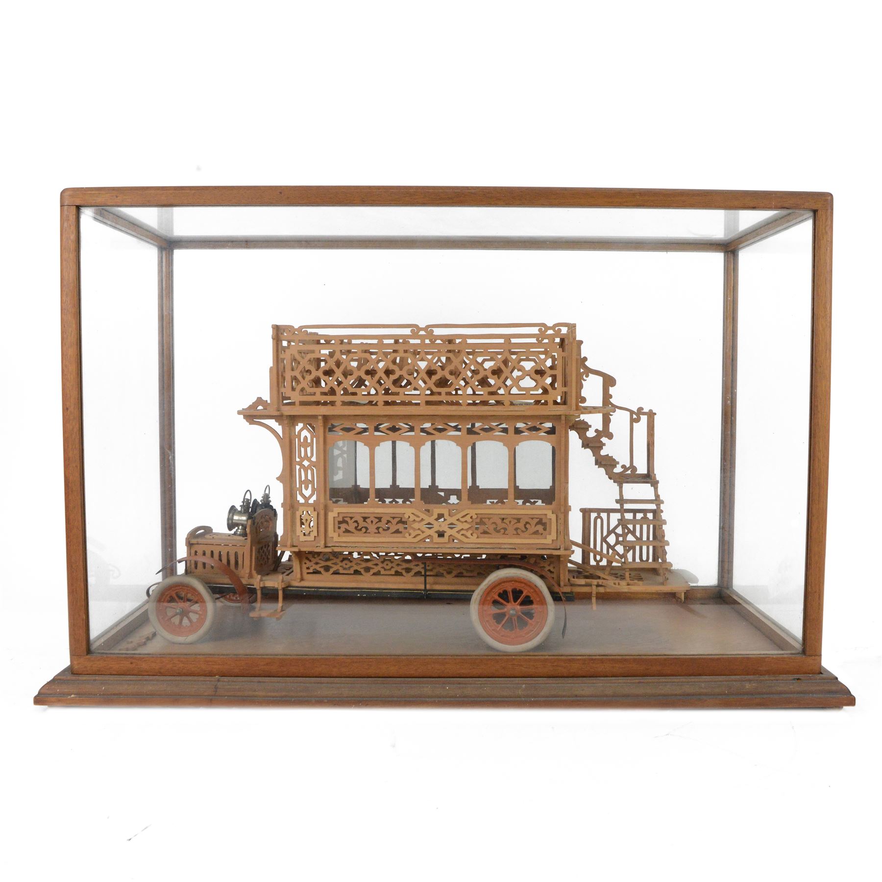 Early 20th century fretwork model of an omnibus, contained within glazed wooden case, case H45cm