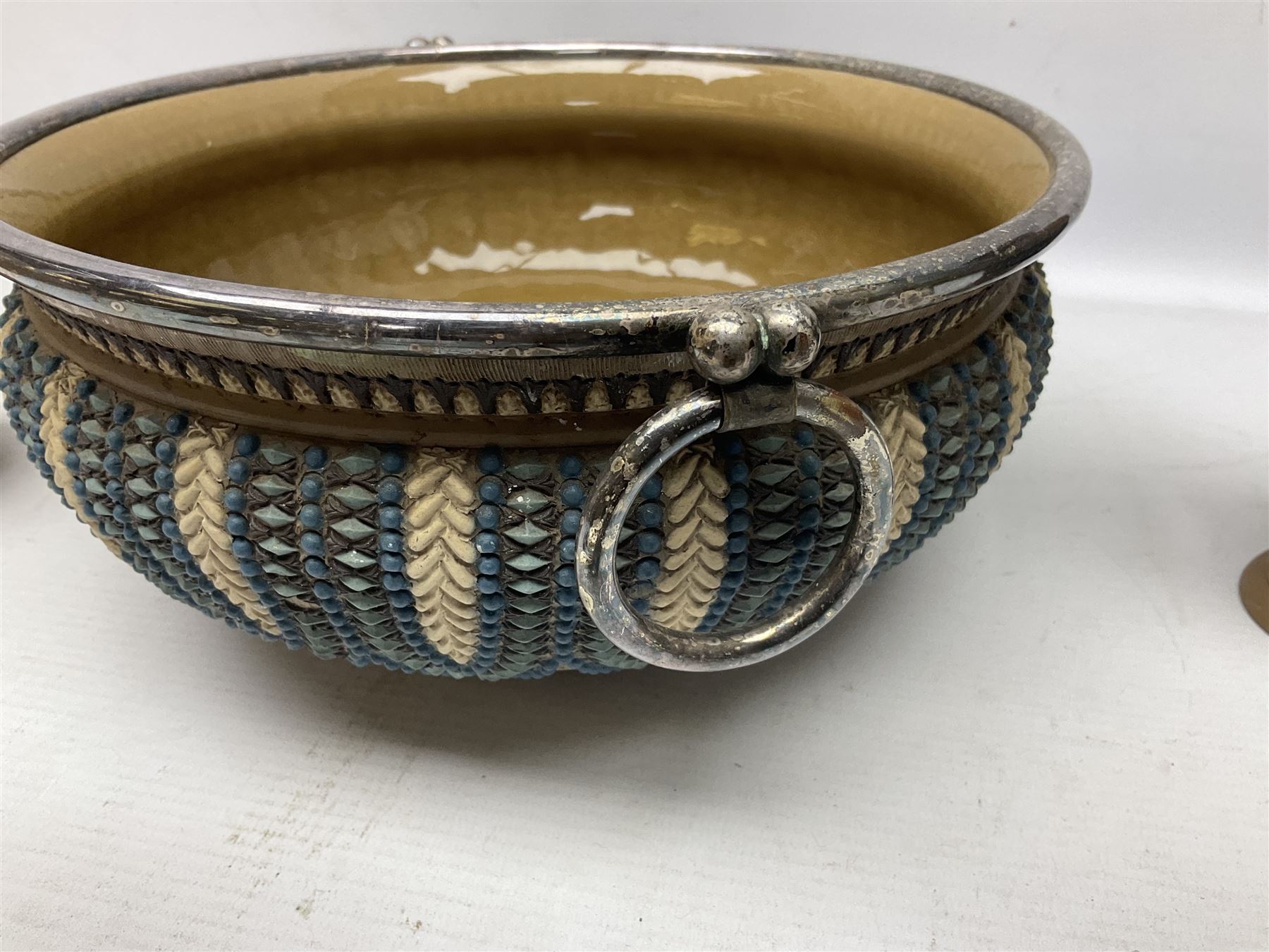 Five pieces of Doulton Lambeth silicon, comprising  salad bowl with plate mounted rim and handles, a pair of similar salad servers, vase and jug, jug H16cm