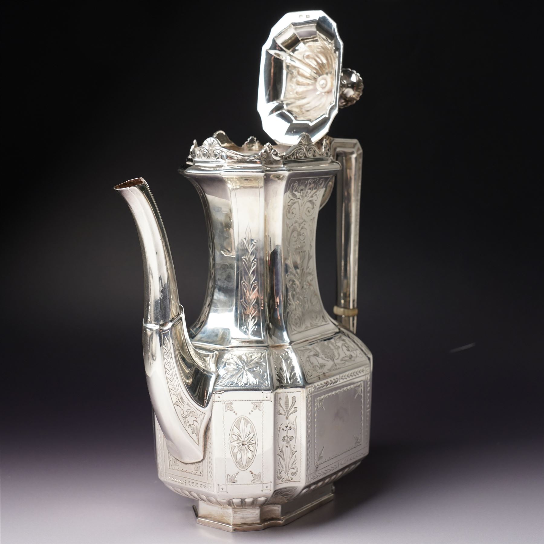 Victorian silver tea and coffee set engraved with classical urns, oval paterae and scrolling foliage, monogram and 'Diligentia et Honore' comprising teapot, tea kettle on spirit heater stand, coffee pot, two handled sugar bowl and cream jug Sheffield 1891 Maker John Round & Son Ltd