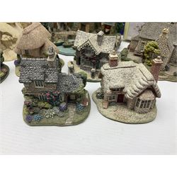 Twenty three Lilliput Lanes, including Village School, Lace's Shoe Shop, Cockles & Muscles, Scotland the Brave etc, together with The Leonardo Collection Paint Box Poppets and Gullivers World magazines 