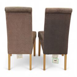 Contemporary pine farmhouse table and four chairs, rectangular top with rounded corners and waxed finish, raised on turned legs painted in terracotta red, set of four contemporary dining chairs, fully upholstered in taupe microfibre fabric with gently flared backs, on square section oak effect legs