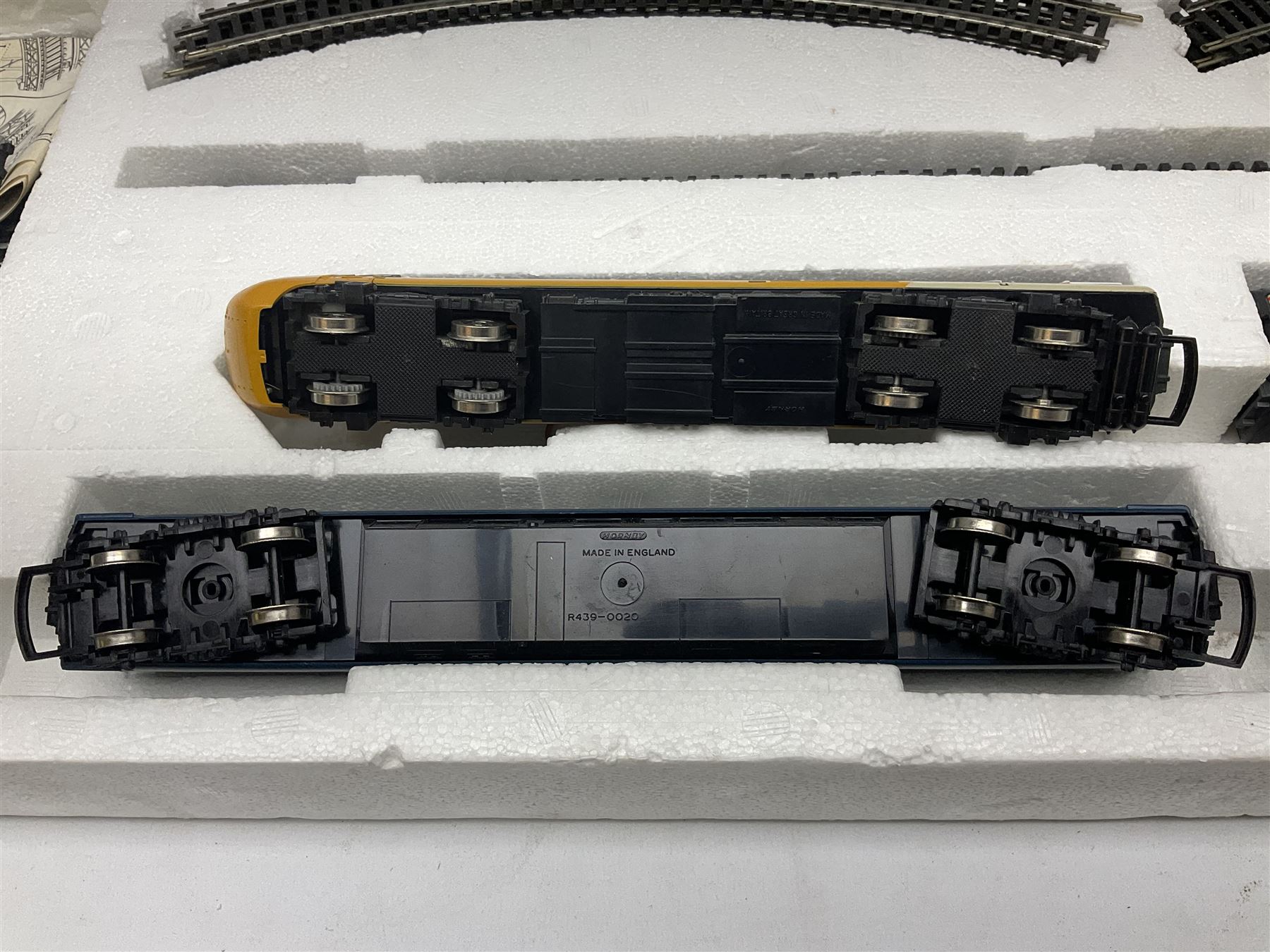Hornby '00' gauge - Intercity 125 2-car set Nos.43010 & 43011 with one coach in original box with track and additional 4-6-0 locomotive and tender No.7476 and goods wagon; and another similar HST Intercity 125 2-car set Nos.43125 & 43126 with two coaches in original box with track and controller (2)