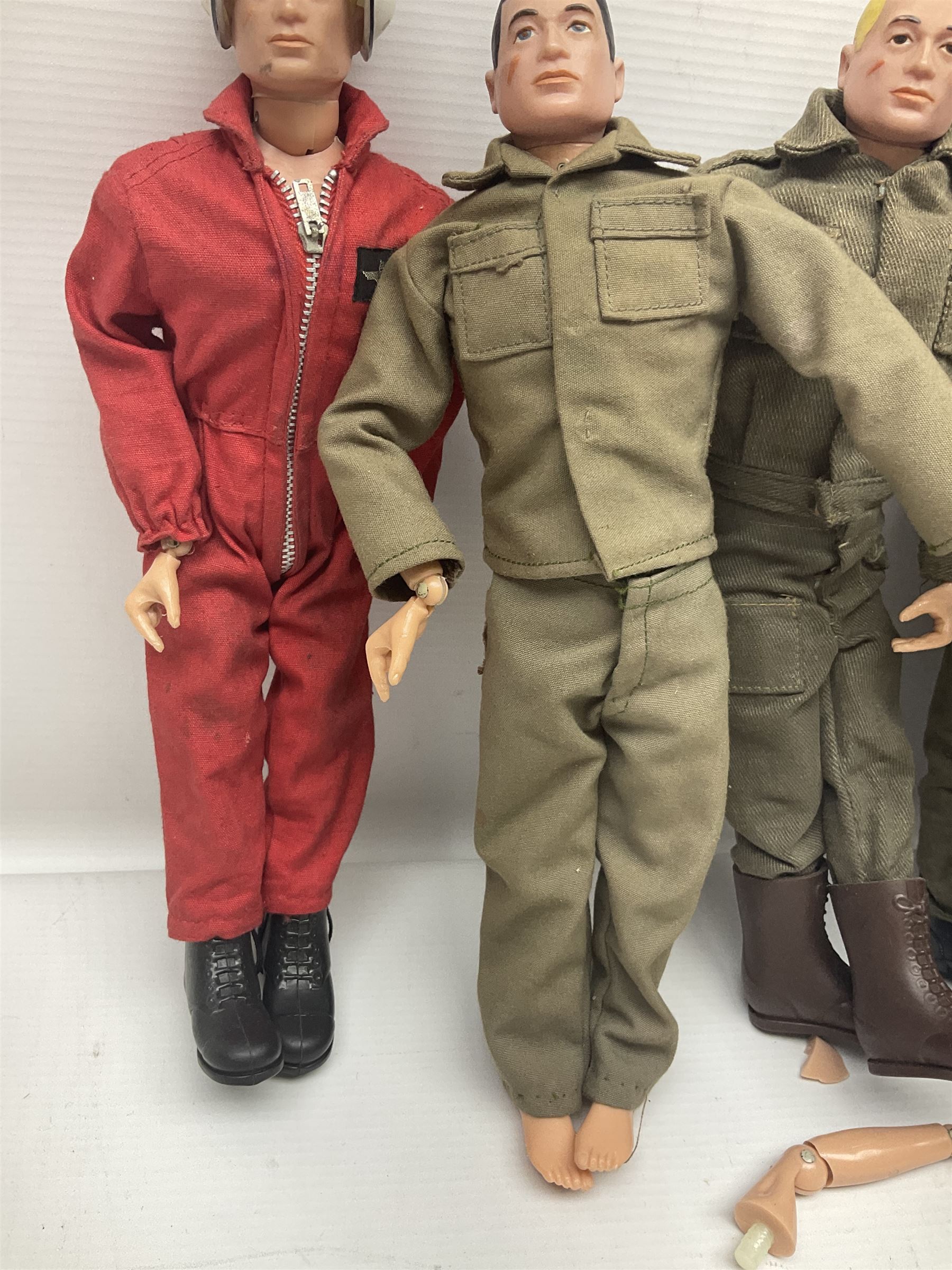 Action Man - five figures marked on the back 'Made in England by Palitoy under licence from Hasbro 1964', one dressed as a German Stormtrooper, one as a Red Devil Pilot and three in army uniform; another similar action figure marked to the right buttock ' G.I. Joe Copyright 1964 by Hasbro Patent Pending Made in Canada' dressed in army uniform; together with an Action Man jeep, field gun, mortar and machine guns and other accessories including helmets and weapons, parachute, diving equipment, skis and snow shoes, boots, uniforms etc; all unboxed