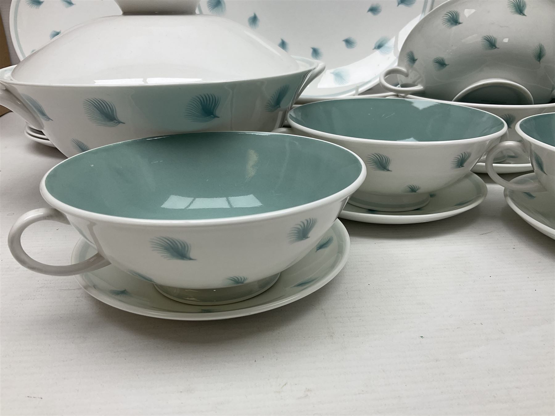 Susie Cooper Whispering Grass pattern dinner wares, to include tureen with cover, six twin handled soup bowls, dinner plates and side plates, etc 
