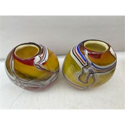 Pair of heavy art glass vases of ovoid form with marbled design on merging yellow, orange and red ground, H37cm