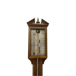 Comitti-20th century mercury stick barometer in an 18th century style mahogany case with satinwood stringing, with a broken pediment, brass finial and round base, silvered register with recording vernier, weather predictions and a centigrade/Fahrenheit spirit thermometer enclosed within a glazed door, visible tube with a bulb cistern and turned mahogany cover.
Mercury clean and present with no air locks.
