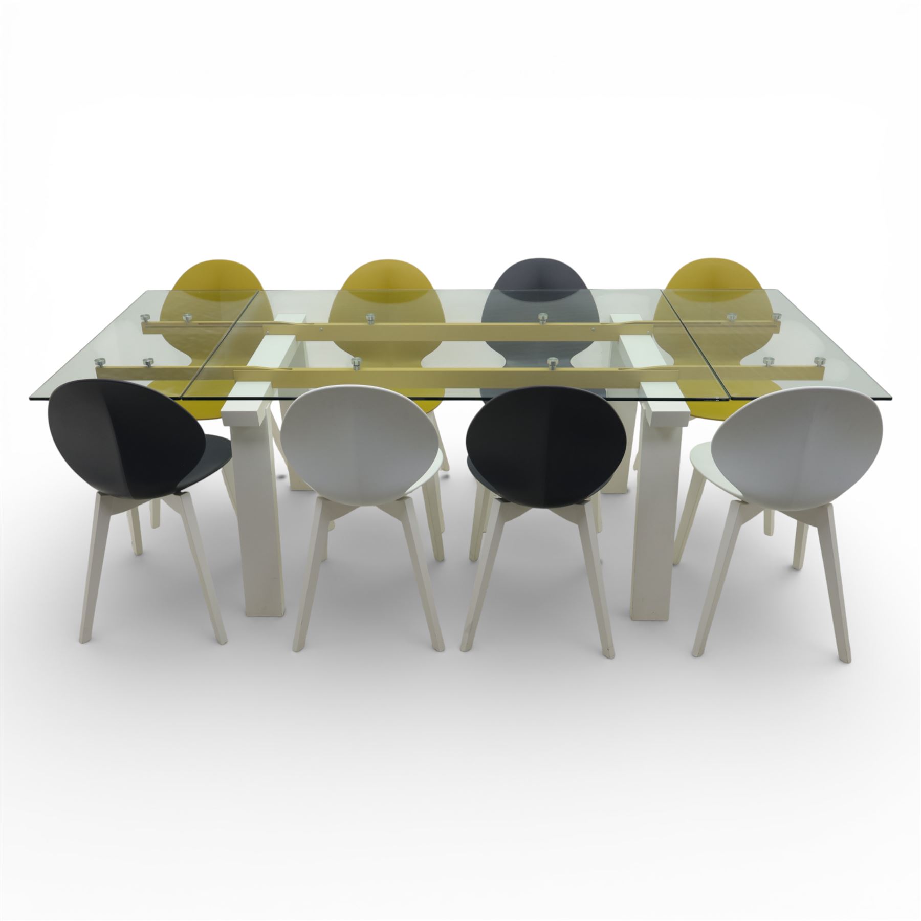 Calligaris - Connubia dining suite, comprising a 'Zeffiro' glass extending dining table and eight 'Academy' chairs, rectangular clear glass top with twin extension leaves extending to 220cm, mounted on white and ochre metal supports with central stretcher, together with eight matching moulded dining chairs with shaped seats and tapered legs