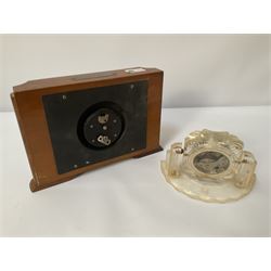 Two Art Deco style mantel clocks comprising a Smith’s 8 Day wooden clock and a clear geometric design clock 