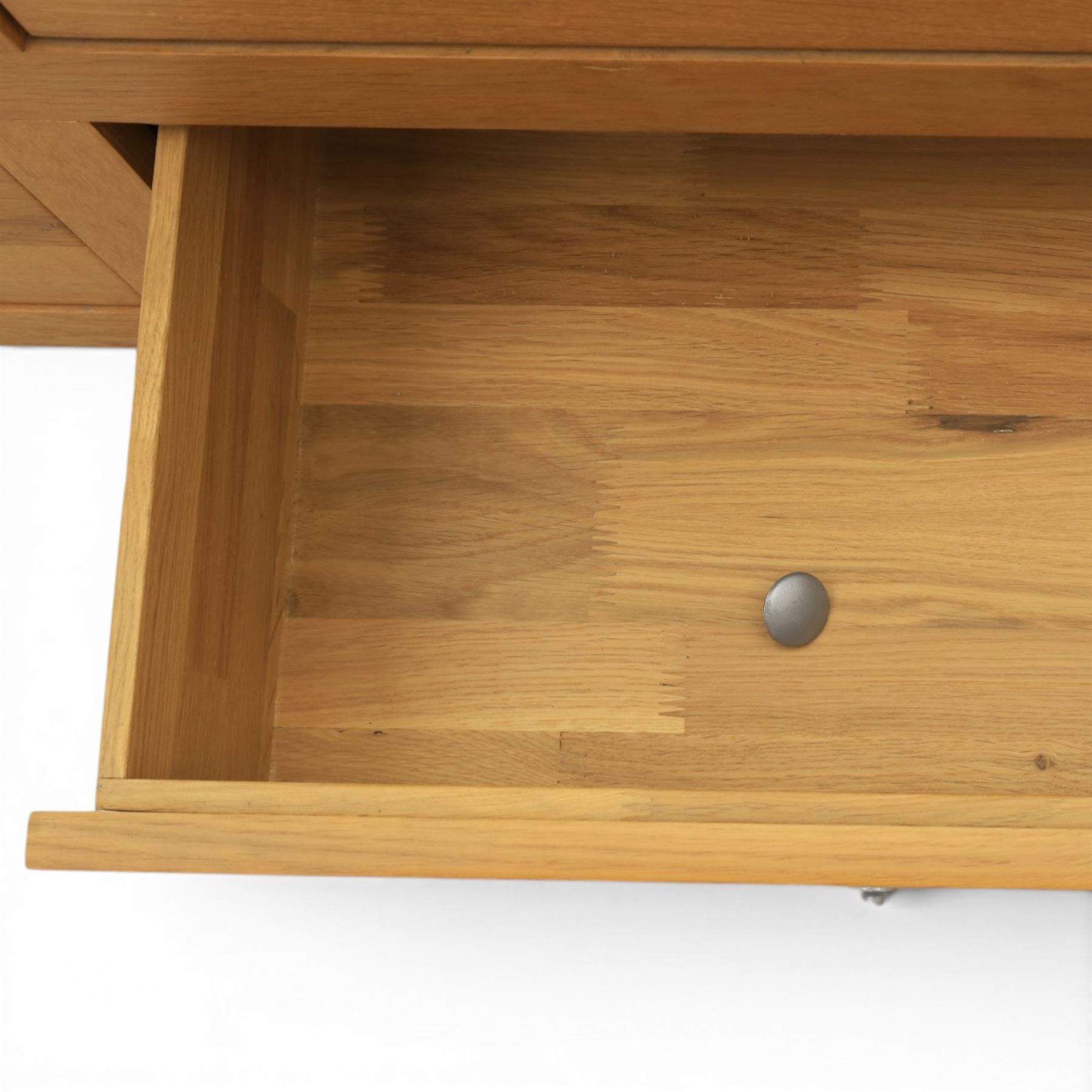 Solid oak chest of drawers, three over four drawers with metal pulls 