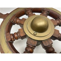 Brass bound teak ship's wheel with eight turned spokes and brass hub, reputedly from the Hull Trawler Arctic Galliard which sailed to New Zealand D47cm