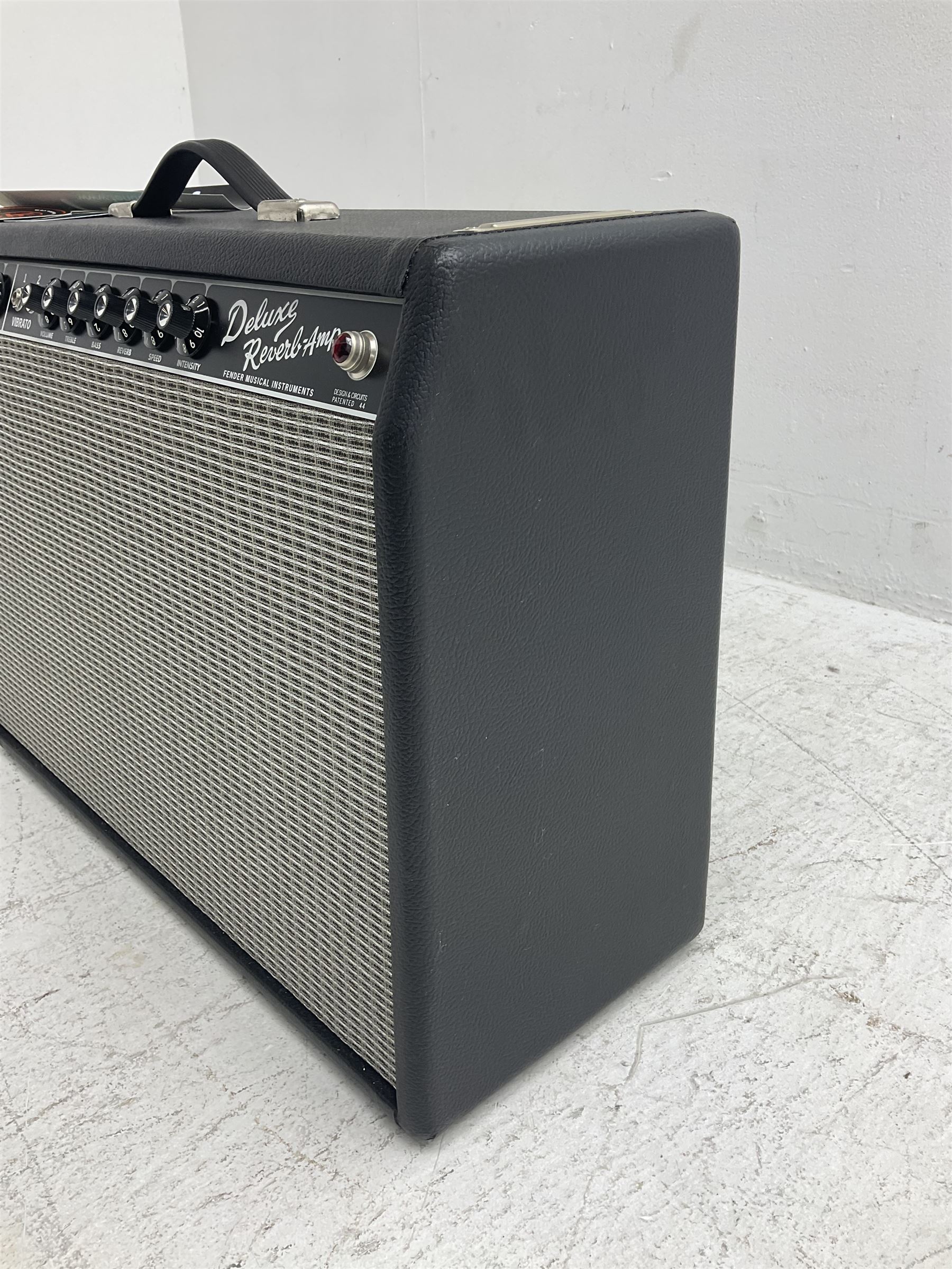 Fender Deluxe Reverb combo amplifier; model 65 Deluxe; type PR-239; 100 watts; made in USA; serial no.AC122232; L61cm; with cover