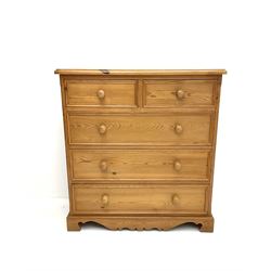 Pine chest of drawers, projecting cornice, two short and three long drawers, shaped apron on platform a support