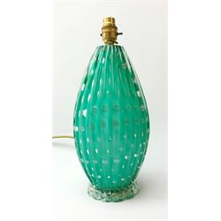 A mid 20th century Murano green glass lamp, designed by Archimede Seguso, of ovoid fluted form with controlled bubble design, including fitting H34cm