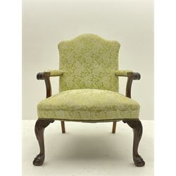 Gainsborough style open armchair, shaped cresting rail and back over curved arms with scroll carved terminals, upholstered in light green fabric with raised floral pattern, sprung serpentine seat with stud work, acanthus carved cabriole supports with ball and claw feet