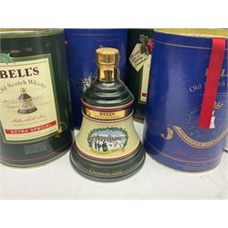 Bells, Scotch whisky, in seven Wade ceramic decanters, including Christmas 1988, 1989, 1990, 1991 etc