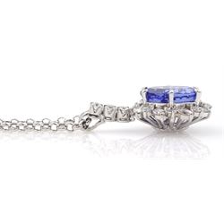 18ct white gold oval tanzanite, round brilliant and marquise cut diamond pendant, stamped 750, on 14ct white gold necklace, stamped 585, tanzanite approx 10.30 carat, total diamond weight approx 1.40 carat