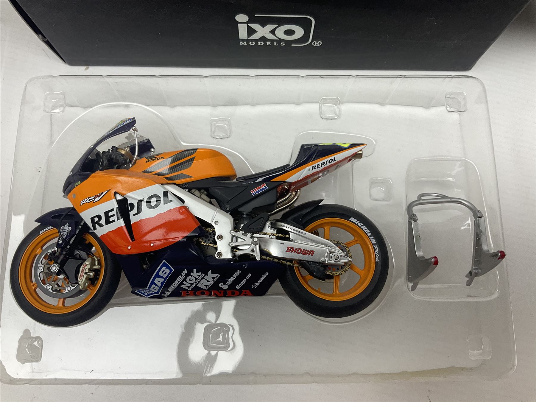 Three Ixo Models 1:12 scale die-cast models of motorcycles - BRB007 Honda NSR500 Michael Doohan 1998; BRB001 Honda RC211V Valentino Rossi 2003; and Yamaha YZR-M1 Colin Edwards MotoGP Phillip Island 2007; all boxed (3)
