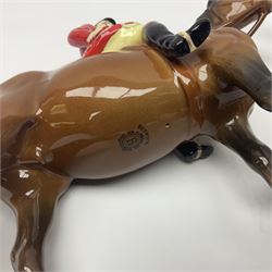 Beswick hunting group, comprising huntswoman on dappled grey horse no 1730, huntsman on bay horse no 1501, two fox figures no 1440 and 1748, and four fox hounds, all with printed marks beneath (8)