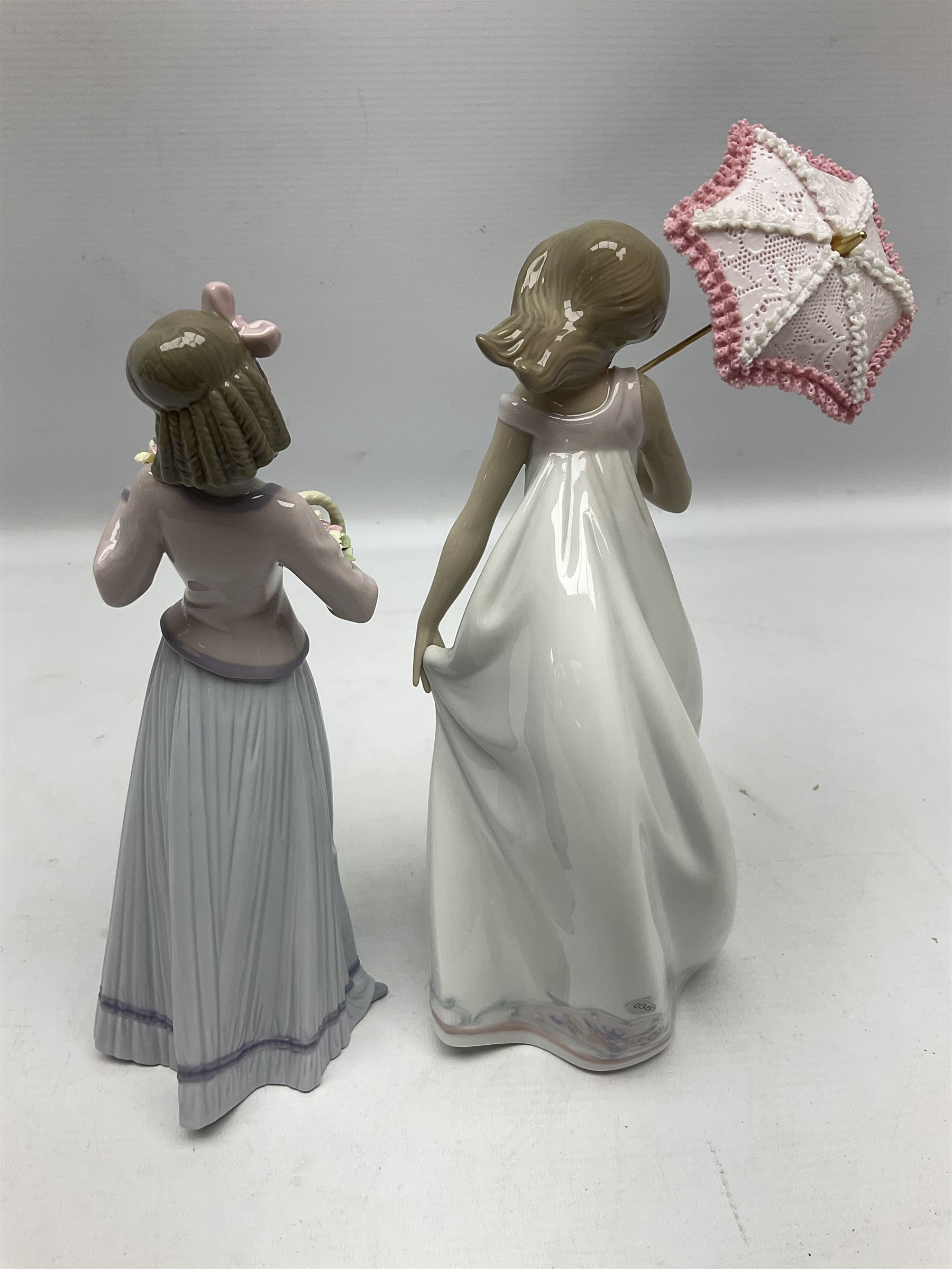 Two Lladro figures, comprising Innocence in Bloom no 7644 and Afternoon Promenade no 7636, both with original box, H28cm