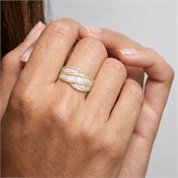 18ct gold diamond crossover ring, channel set with three rows of baguette cut diamonds, 1994