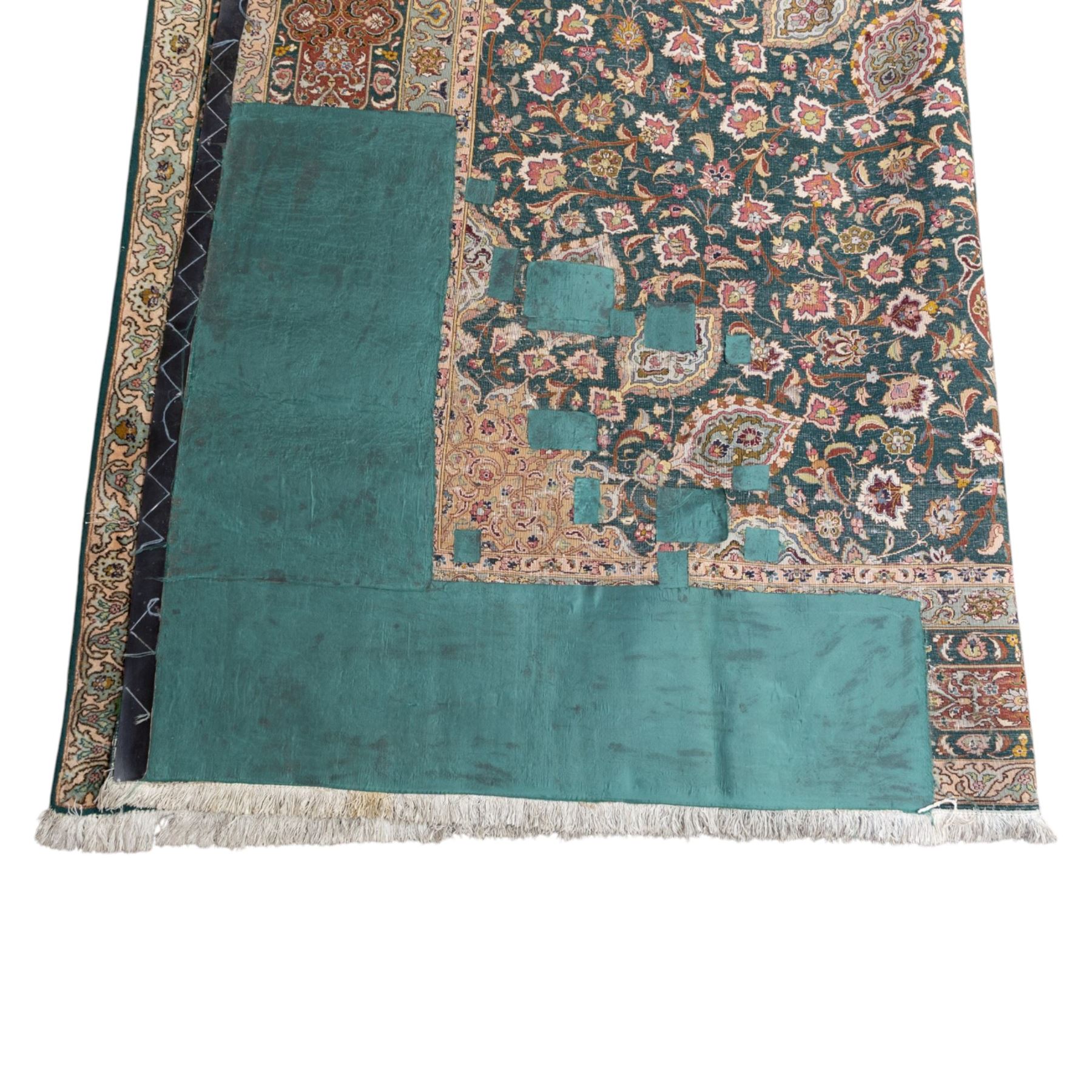 Persian Tabriz type carpet, the teal ground decorated with central medallion, radiating palmettes and dense floral scrollwork, within multiple floral borders