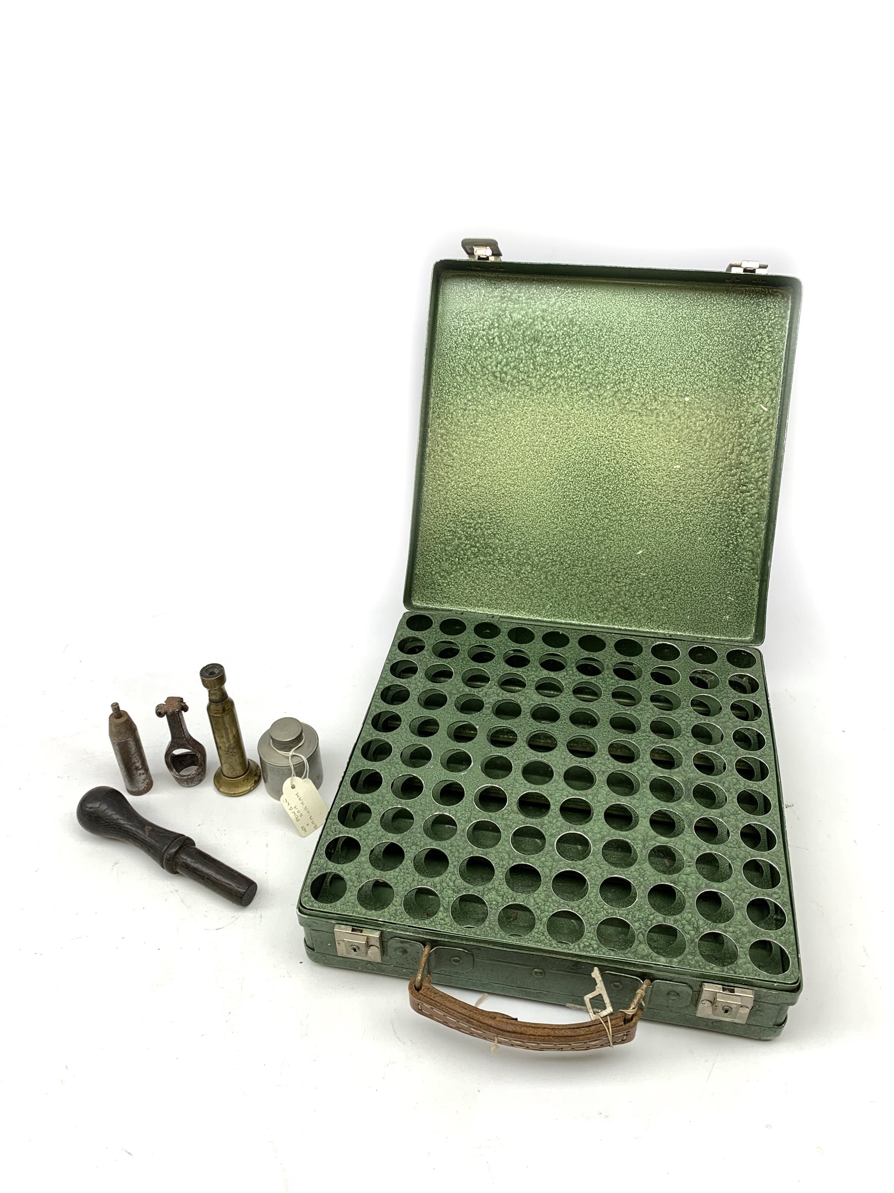 19th century and later predominantly 12-bore cartridge making equipment including American Ideal Mfg. Co. Middlefield Ct. re-loader, unmarked brass re-loader, Berica crimper, James Dixon and Webley recappers, Wm. Powell & Son Birmingham oil bottle, turned wooden rammer etc; and green metal cartridge carrying case