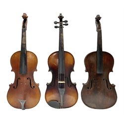 Czechoslovakian violin for completion c1920 with 36cm two-piece maple back and ribs and spruce top L59.5cm overall; in ebonised wooden 'coffin' case; another later Czechoslovakian violin c1950 bearing Stradivarius label; in carrying case; and a 1920s amateur made violin for completion (3)