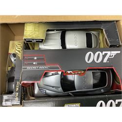 Two Toy State 007 large scale radio controlled cars - Aston Martin DB5 and Aston Martin DBS; eight other Toy State 007 James Bond vehicles; and ten other James Bond vehicles by Corgi and Fabbri; all boxed (20)