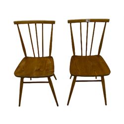 Pair of 1960s Ercol stick back elm and beech kitchen chairs