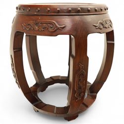 Pair of early 20th century Oriental hardwood barrel seats, of drum form with shaped apron and pierced panels, carved with stylised scrollwork and studded detail to the top