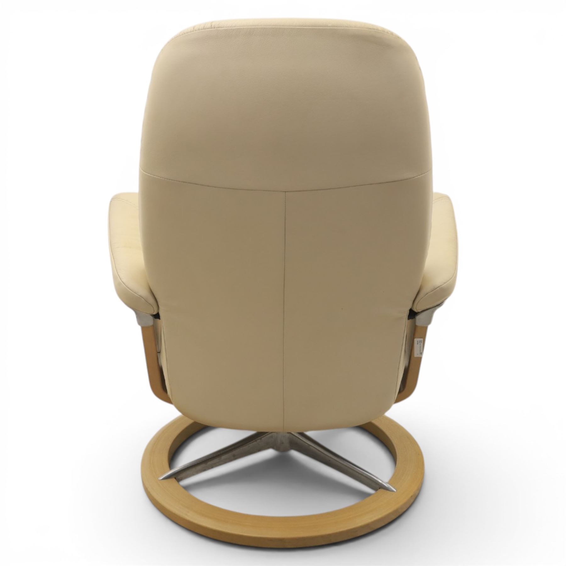 Ekornes - Stressless reclining beige leather armchair and stool, raised on brushed steel frame, light oak rotating base