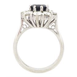 White gold round cut sapphire and round brilliant cut diamond cluster ring, stamped 18ct, sapphire approx 1.35 carat, total diamond weight approx 1.20 carat