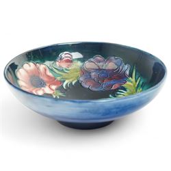 Moorcroft bowl in Anemone pattern upon a blue ground, with printed and painted mark beneath, D21cm