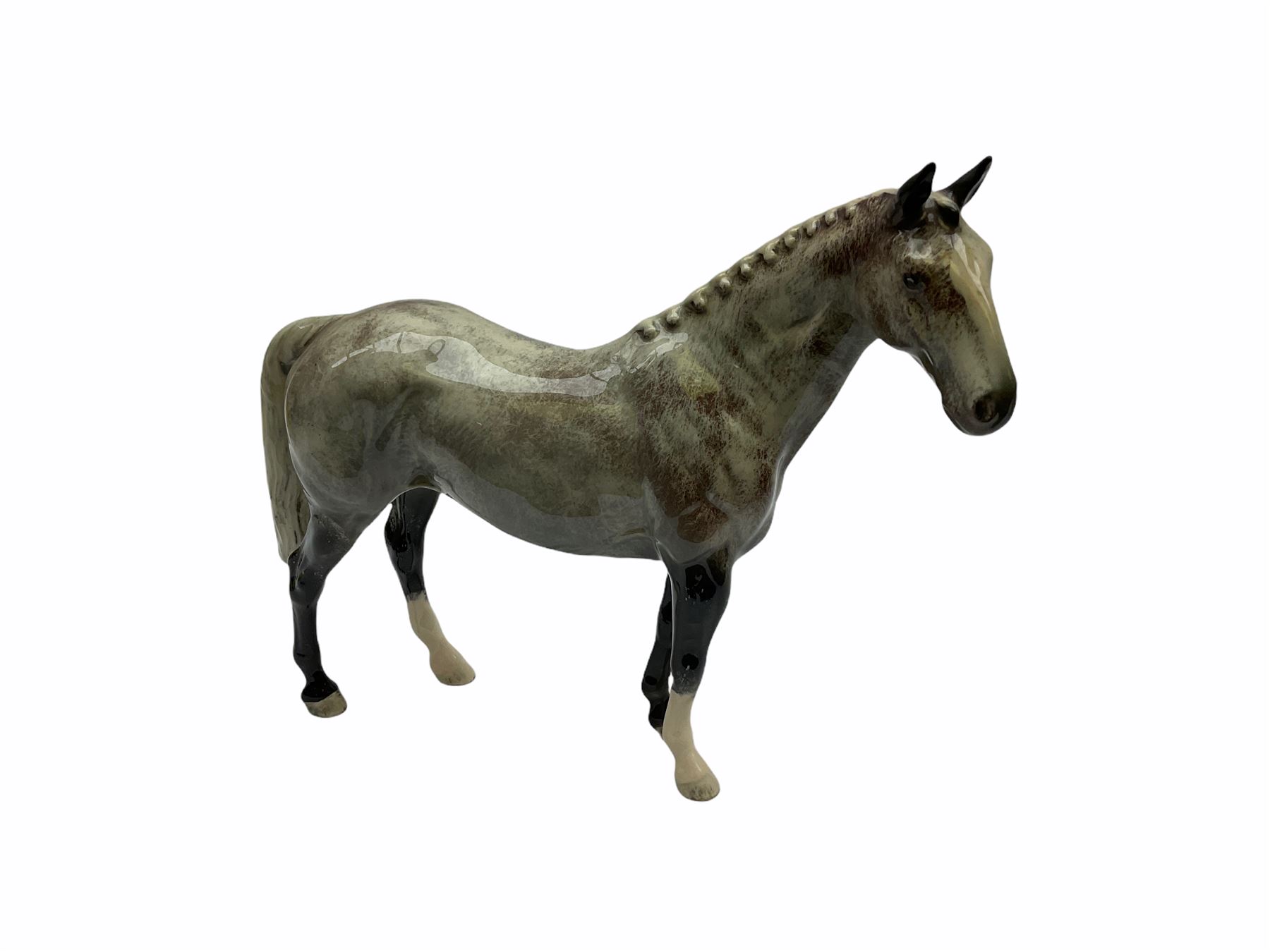 Beswick figures, comprising Afghan Hound 2285, St Bernard 'Corna Garth Stroller' 2221, Rottweiler 3056, Greatdane 'CH Ruler of Ouborough', Fox, Elephant, and dappled grey type horse. 