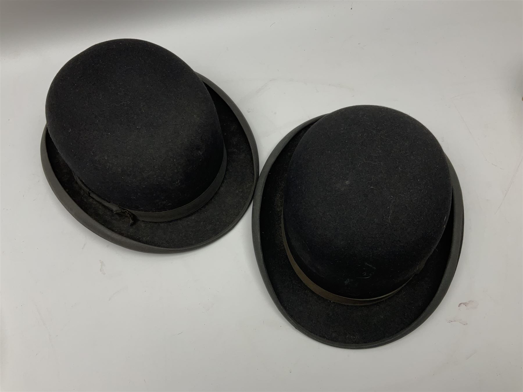 Two bowler hats by Dunn & Co