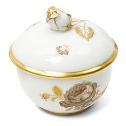 Furstenberg tea service decorated with sprays of flowers within a gilt rim comprising twelve cups and saucers, twelve plates, tea pot, hot water jug, milk jug, sugar bowl and cover and cake plate