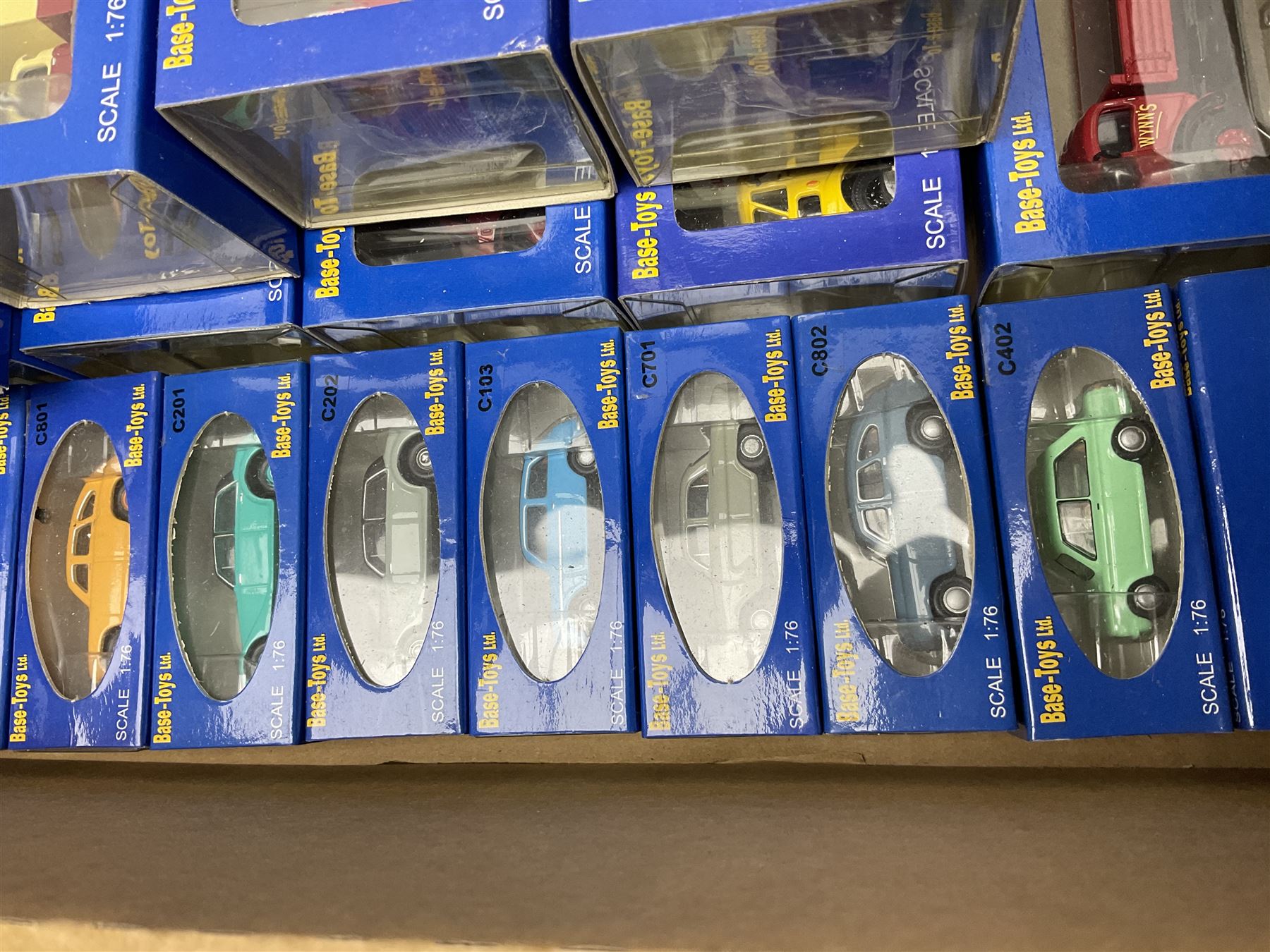 Fifty-seven Base Toys 1:76 scale die-cast models, all boxed (57)