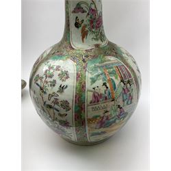 A 19th century Chinese Canton Famille Rose vase, of globular form with tall neck, and cover with finial, decorated with alternating panels of figural scenes, and birds and butterflies amongst blossoming and fruiting trees, with foliate surround against gilt, overall H57cm. 