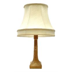 'Mouseman' carved oak table lamp with mouse signature, fitted with cream shade, by Robert Thompson of Kilburn, H25.5cm (measurement not including shade and fitting)