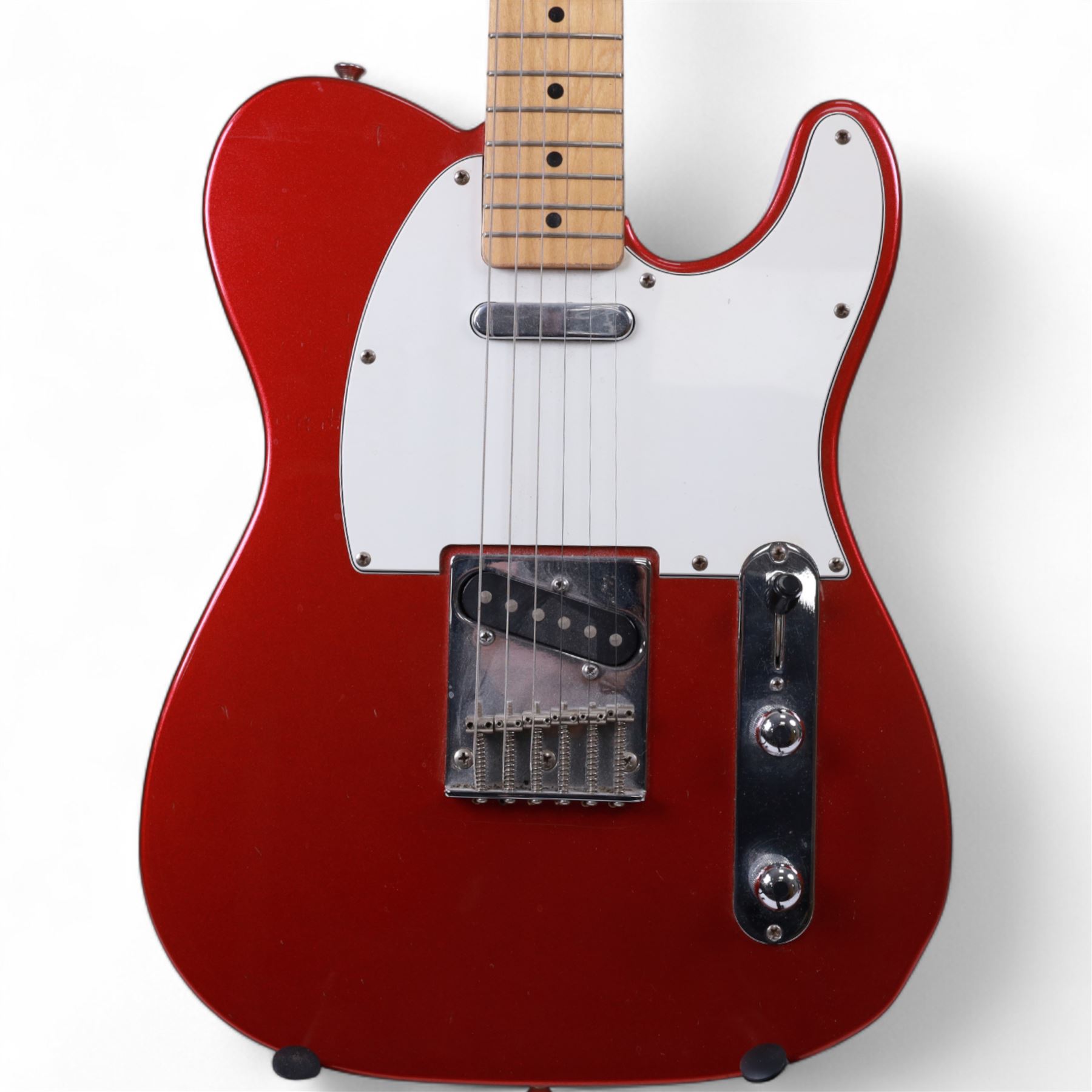 Fender Telecaster electric guitar, serial no. T021384 made in Japan c.1994, with Candy Apple Red body, white scratch plate and maple neck, guitar L98cm