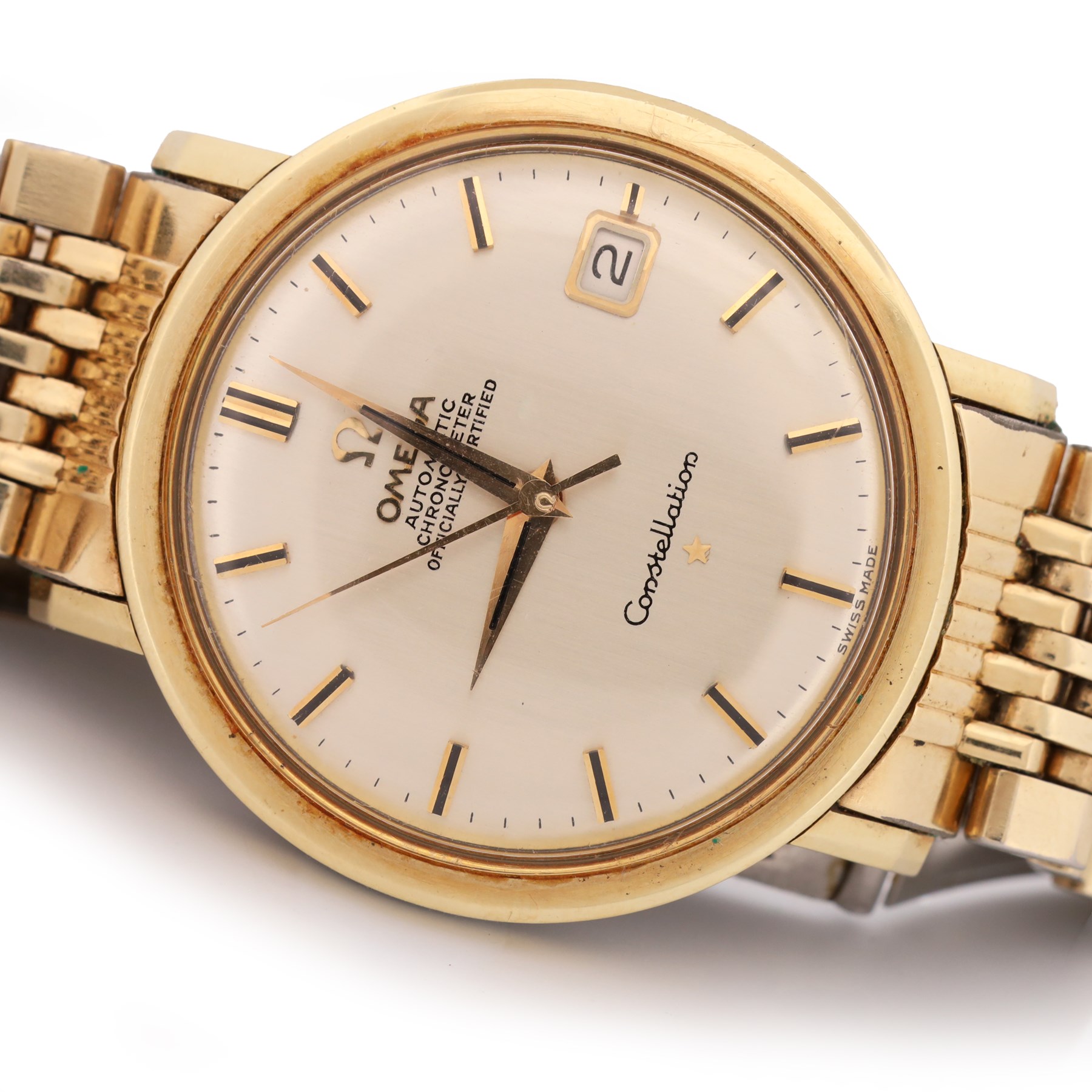 Omega Constellation gentleman's gold-plated and stainless steel automatic chronometer wristwatch, Ref. 168.004, Cal. 561, champagne dial with baton hour markers and date aperture, on Omega gold-plated bracelet, with fold-over clasp 