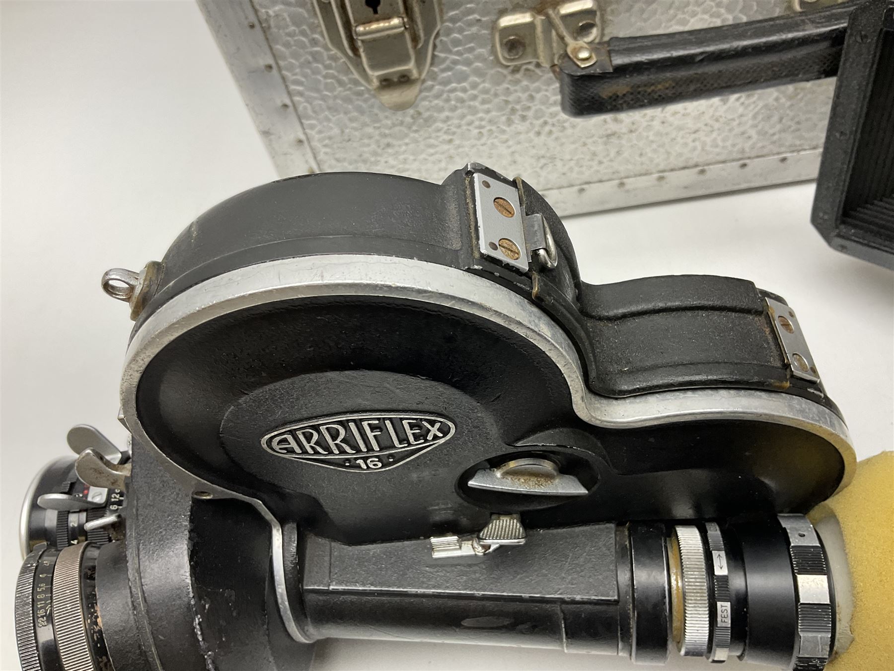 Arriflex 16SB camera body, serial no. 1784, with ' Carl Zeiss Distagon 1:2 f=8mm' lens, serial number 3860224, 'Carl Zeiss Jean Tessar 2/16' lens, serial no 3624355, camera pistol grip and other accessories, in fitted hard case