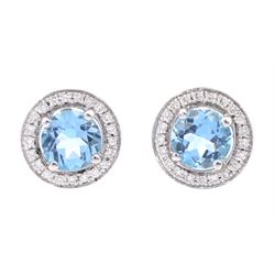 Pair of 18ct white gold blue topaz and round brilliant cut diamond circular stud earrings, hallmarked, total topaz weight approx 1.00 carat