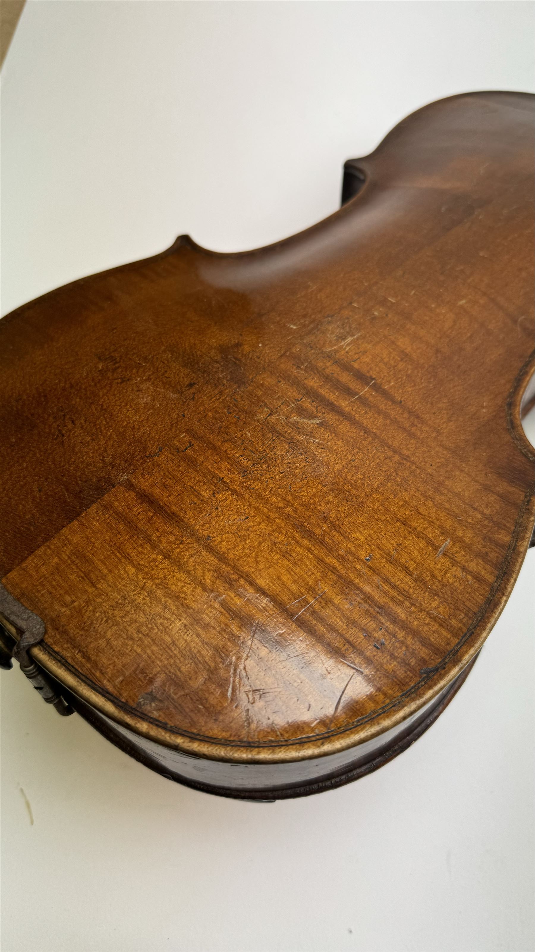 18th century Violin with bow, scroll with ebony pegs, fingerboard and tail piece, body length 60cm in  a fitted hard case. Internal label reads Joannes Georgius Thir, Vienna 1776.