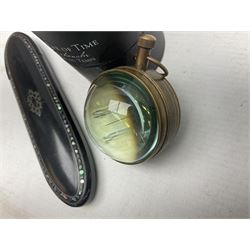 Abalone inlaid black lacquered papier-mâché spectacles case, together with a small modern globe clock (2)